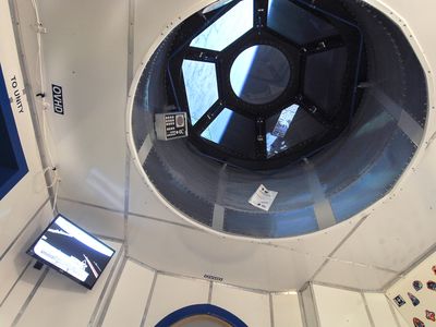A view of Earth from a replica of the Cupola Observation Module.