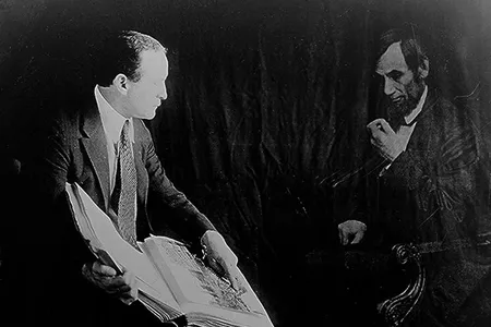 Houdini exposed fake Spiritualist practices by having&nbsp;himself photographed&nbsp;with the "ghost" of Abraham Lincoln.