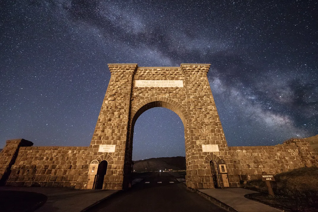 Roosevelt Arch under a starry sky