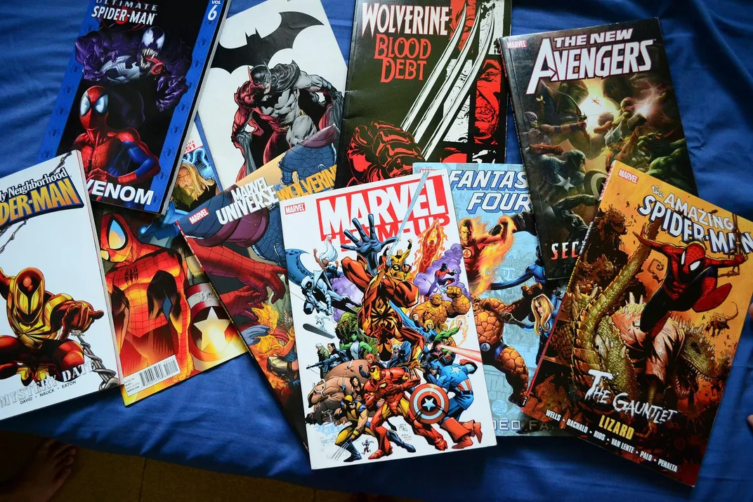 Several comic books displayed together