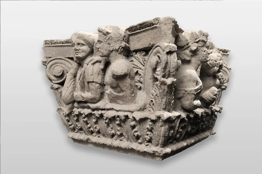 Second-century B.C. capital depicting married couples, satyrs and maenads