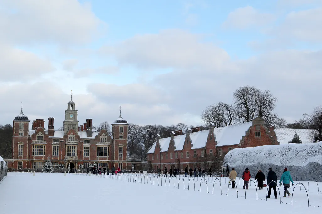 People enjoy the recent heavy snowfall at Blickling Hall in Norfolk 