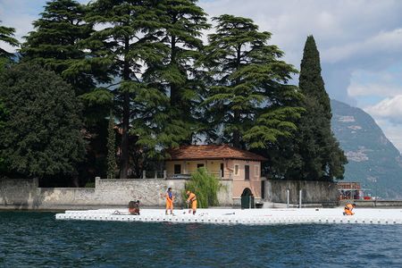 Workers start to encircle the island of San Paolo with the first floating elements, April 2016.