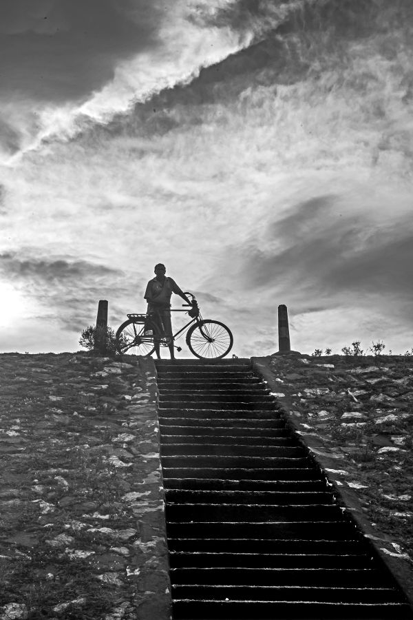 The Lone Cyclist Against the Sky thumbnail