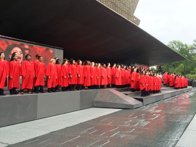 The Voice of Tomorrow Choir on the front porch of the new National Museum of African American History and Culture