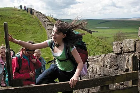 Where fierce legionaries once marched, history buffs (students from Newcastle Church High School) nowadays hike.