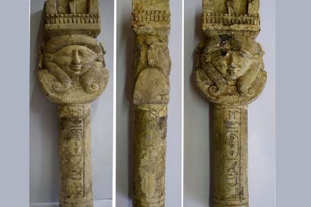 A limestone pillar depicts the goddess Hathor, who was worshipped at the temple.