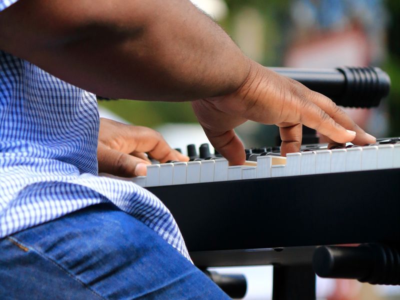 A black keyboardist playing in a blues band Smithsonian Photo Contest