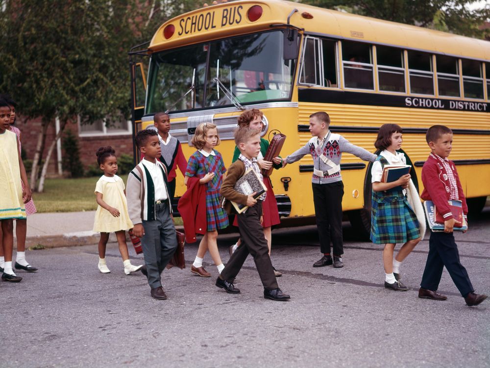 1960s school bus and school children