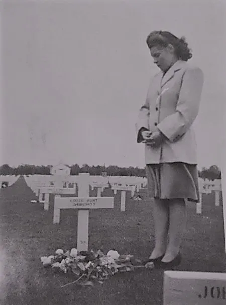Betty Vrancken visiting the grave of Eddie Hart