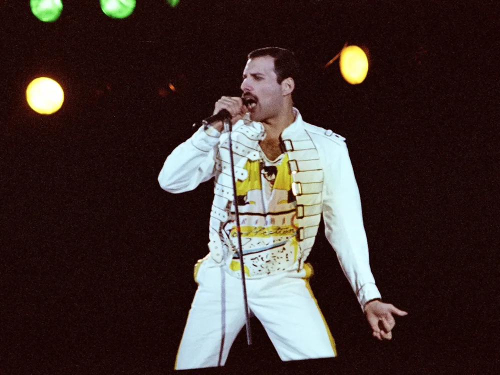 Freddie Mercury performing live on stage in 1986