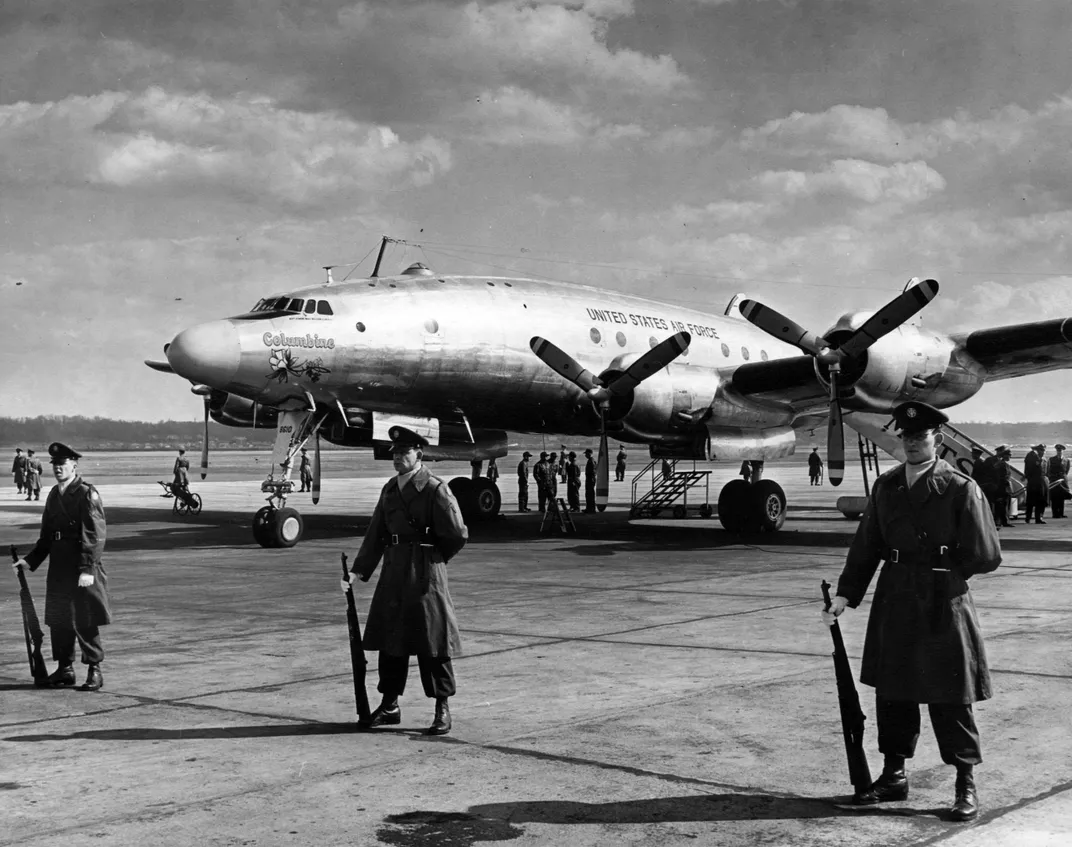 Flanked by military guards, Columbine II waited for Eisenhower to board