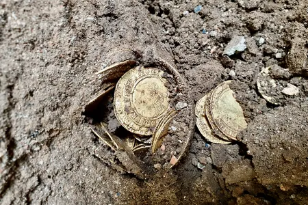 An anonymous couple found the trove of coins while renovating their house in 2019.