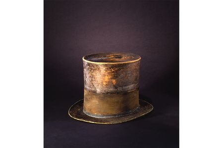The top hat, with a silk mourning band for his son Willie, was worn last to Ford's Theatre on April 14, 1865.