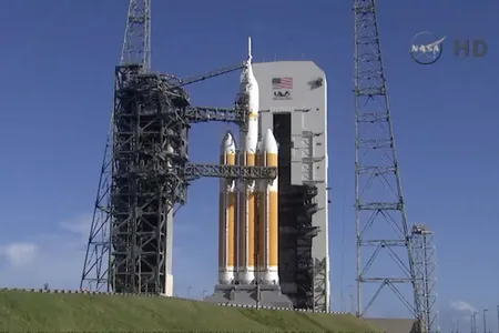 The Orion capsule idles on the pad atop a Delta IV Heavy rocket just minutes after the launch was canceled. 