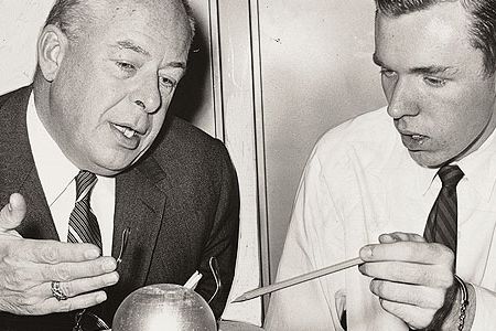Kauffeld and Bruce Tully discuss a model that Tully built in his high school shop class.