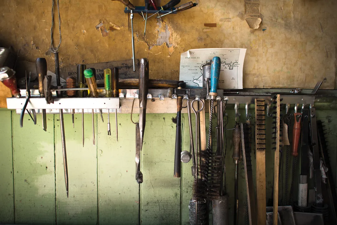 tools hang on a wall