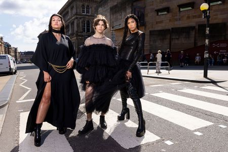 Models Shannon Summers, Joshua Cairns and Grace Dempsey arrive at the National Museum of Scotland ahead of the opening of "Beyond the Little Black Dress."
