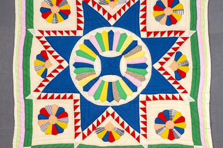 Dresden Star Medallion Quilt” by Emma Russell. Object no. 2007.5001.0002 Anacostia Community Museum, Smithsonian Institution.

