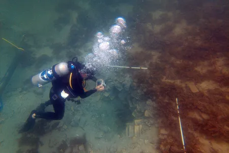 Marine archeologist Andreas Kallmeyer Bloch documents the shipwreck.