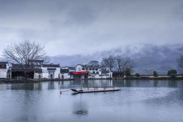 Water town in misty rain thumbnail