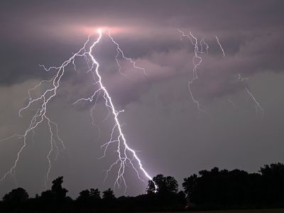 Lightning strikes over the countryside near Potsdam, Germany, on July 10, 2024, following a period of high temperatures.