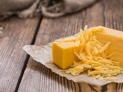 What makes cheddar so good? A community of microorganisms working in harmony.