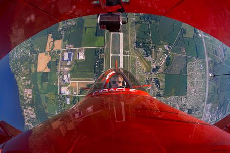 Above Oshkosh in 2015, Tucker shows off a hallmark of his performances: exuberance.