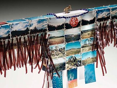 Contemporary Northern Cheyenne artist Bently Spang wove together photographic negatives and prints of his family’s Montana ranch to design a variation on a traditional war shirt.
