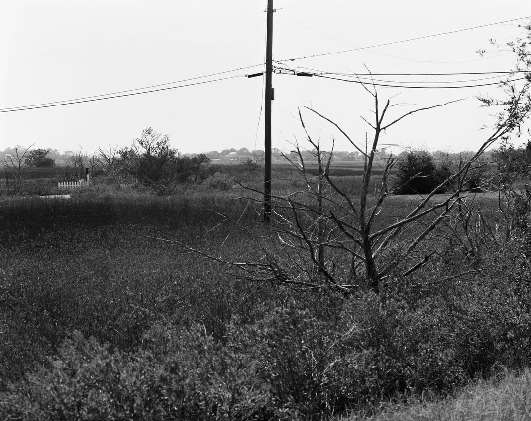 The Telephone pole and the White Picket Fence Smithsonian Photo