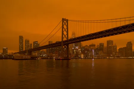 Smoke from nearby wildfires turned the sky above San Francisco a dark orange color last September. 


