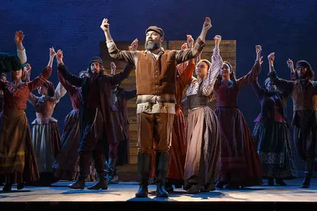 The new Broadway hit revival of Fiddler on the Roof deliberately breaks with tradition in its opening and closing scenes.