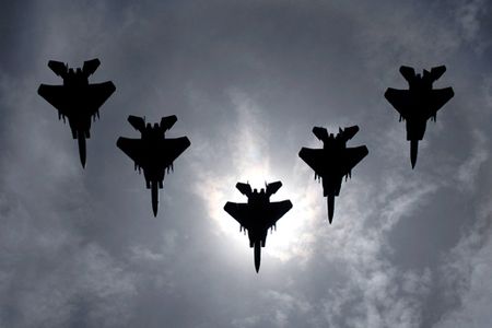 A flight of F-15C Eagles from the 44th Fighter Squadron, Kadena Air Base, flies during a total solar eclipse over the island of Okinawa, Japan July 22, 2009. The eclipse was a rare opportunity for service members stationed here to witness this unique event. (U.S. Air Force photo/Airman 1st Class Chad Warren)