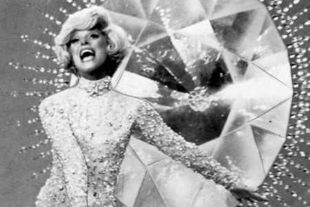 Channing (as Lorelei Lee, 1974) recalls taking her first bow in a dress encrusted with 40 pounds of bling: “I fell over forward and almost broke my teeth.”