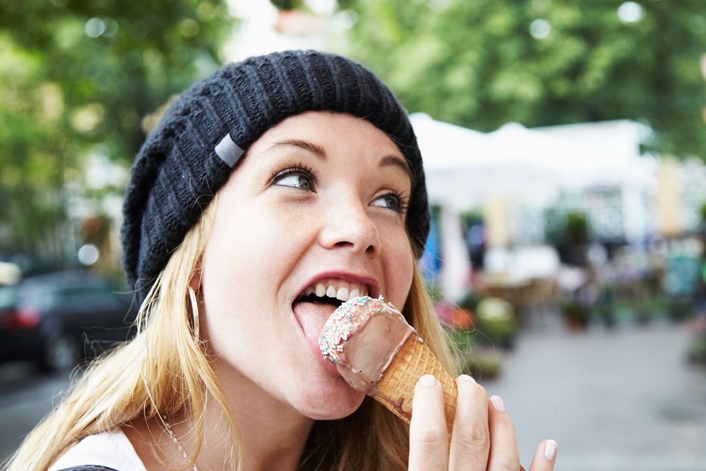 Woman Eating Ice Cream Cone