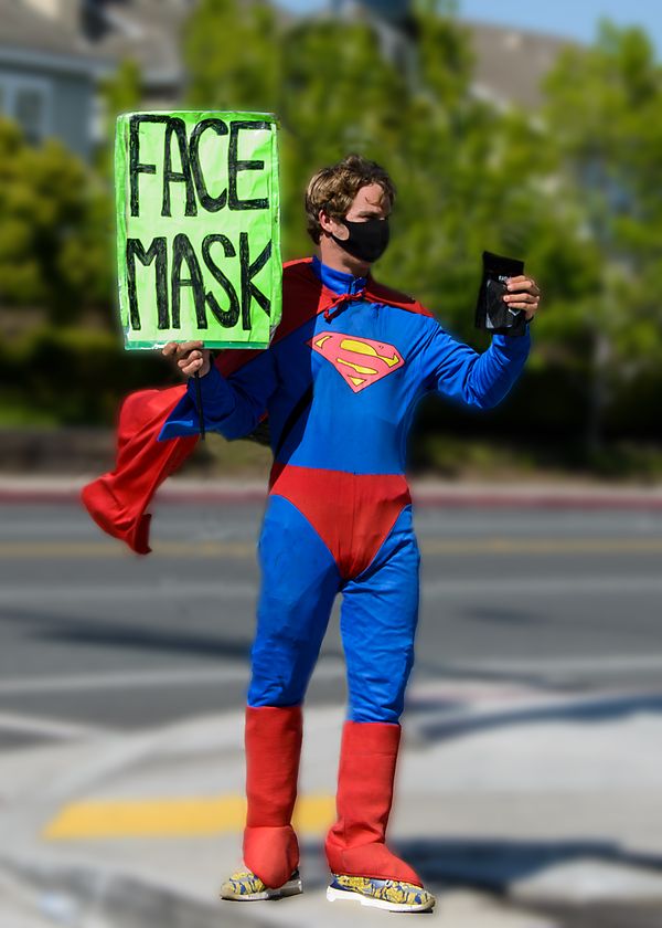 A young man selling face masks during the Covid epidemic. thumbnail