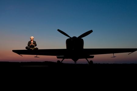 Patty Wagstaff, in the lotus position on her Extra’s wing. “Be kind to yourself and stay disciplined,” she says, “as that is where you will find the most freedom.”