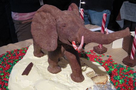 A chocolate model of the African Bush Elephant in the rotunda of the Smithsonian’s National Museum of Natural History on top of a festive holiday cake celebrating the museum. (Smithsonian Institution)