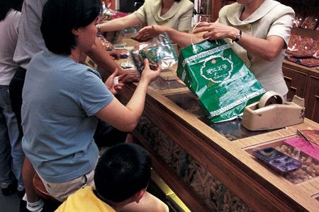 American ginsengwhether wild or cultivated (for sale at left in New York)commands higher prices than Asian varieties.