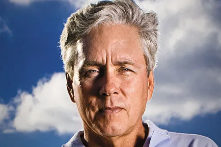 The human race "has not been elevated" over the past 40 years, Carl Hiaasen says.