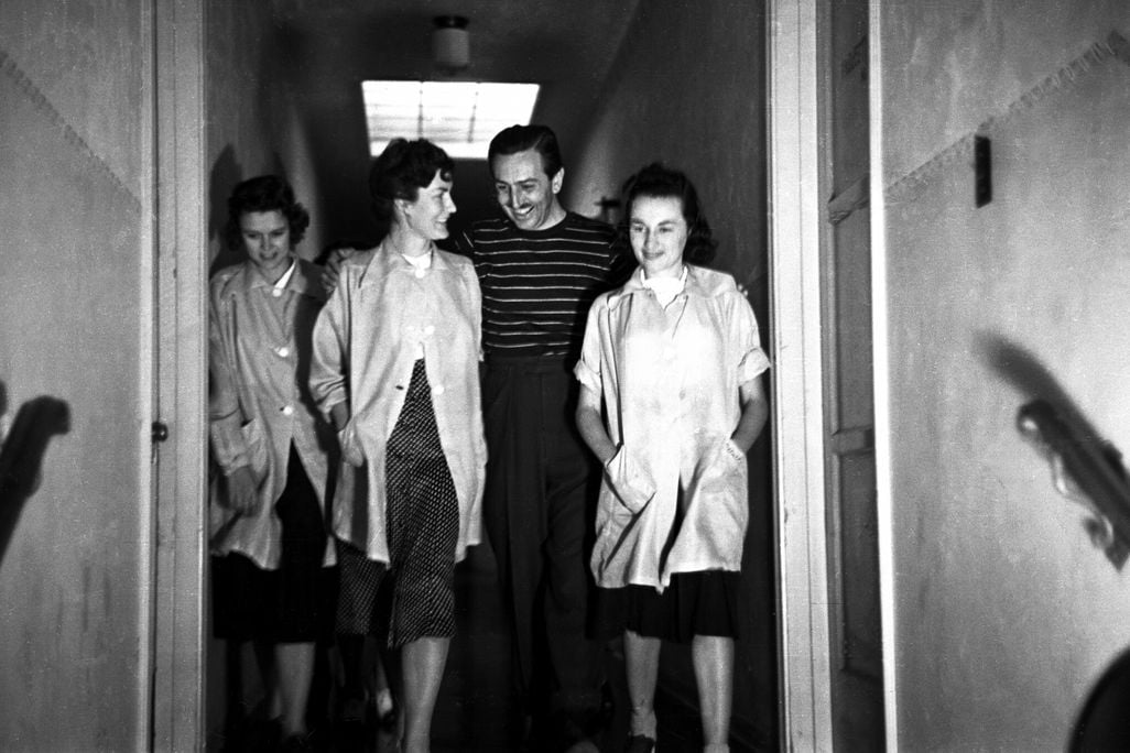 Tompson (far left) with colleagues Dot Smith, Walt Disney and Donna Luppo in an undated photo