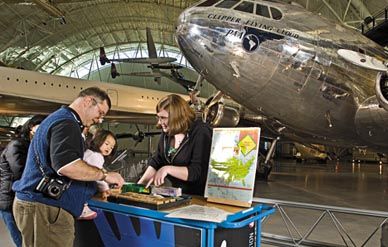 Katherine Peterson teaches visitors about airport codes.