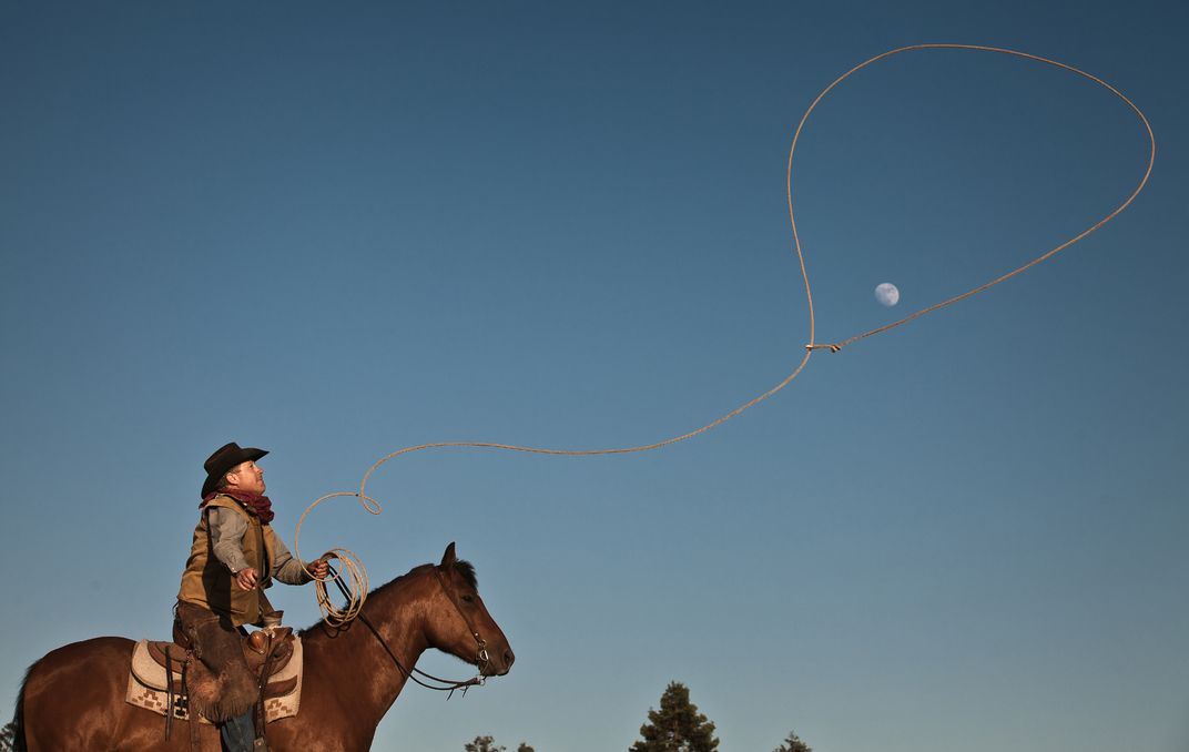 Cowboy Dean Spinelli throws up his rope to lasso the moon