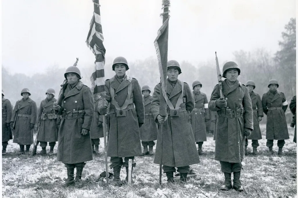 Stunned survivors of the Lost Battalion rescue stand ready for review by General Dahlquist