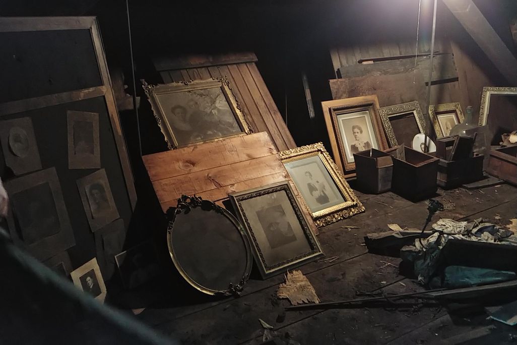 Frames and photographs found in the secret attic studio