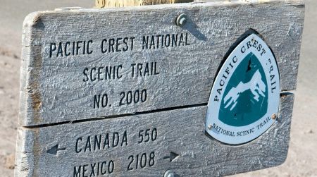 Hikers attempting to walk the entire Pacific Crest Trail face some serious mileage—whichever way they’re going. This trail sign is near Mount Hood, in Oregon.