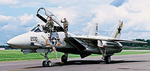 Dale Snodgrass is known as a virtuoso of the F-14 (left, with squadron ops officer Dirk Hebert at right, in 1990).