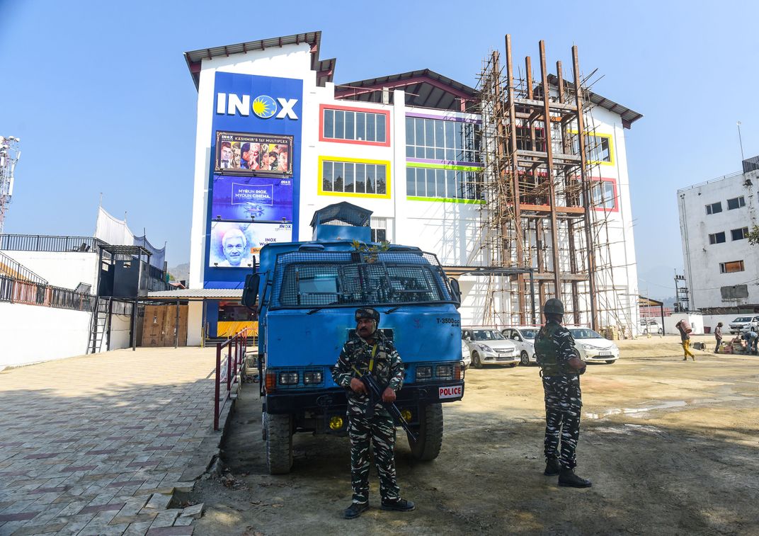 Security forces stand guard outside Kashmirs first-ever multiplex 'INOX' on September 30, 2022 in Srinagar, India. 'INOX' is the first multiplex in Kashmir that will be thrown open to the public from October 1, 2022.