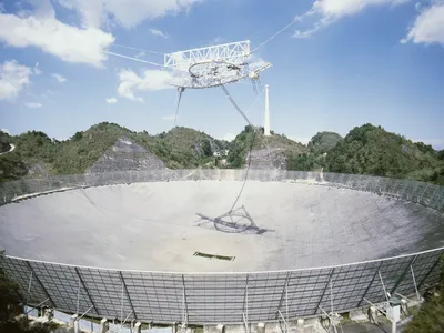 The Arecibo Observatory in Puerto Rico, one of the radio telescopes used to detect the pulses from pulsars in the new research. The telescope started to fall apart in 2020 and was decommisioned.