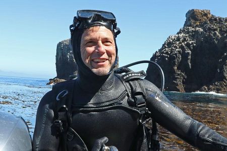Kevin Lafferty emerges from the waters off Anacapa Island near Ventura, California, after spearing fish in March 2018. He’s advising a UCSB PhD student on research to determine if reef fish inside protected marine reserves have more or fewer parasites than depleted fish populations outside the reserve. It’s to test a pattern that has emerged in other studies: that parasites thrive with richness and abundance of marine life. 